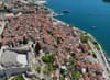 Netko je bijelom bojom išarao znak na ulazu u Šibenik