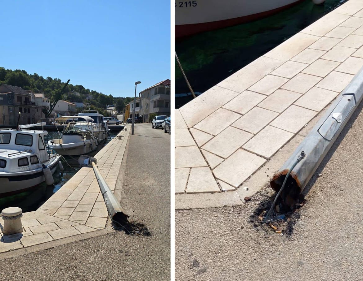 OPASNOST NA OTOKU ŽIRJU Srušen stup javne rasvjete pod visokim naponom prijeti otočanima i gostima, nadležni ne reagiraju!