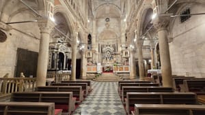 Šibenske jaslice danas kontaminirane zloslutnim crnim insignijama, a usred rata biskup Badurina išao na okupirana područja, sa svećenicima pozivao na ekumenizam i pomirenje!