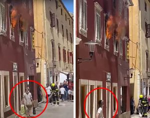 VIDEO Žena prolazi ispred opožarene zgrade kao da sutra ne postoji